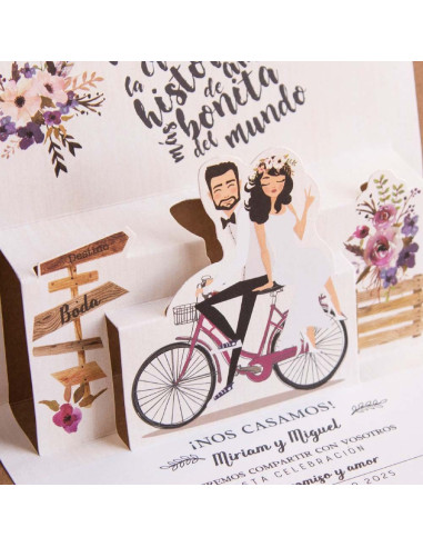 Invitación de boda novios en bicicleta