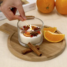 Vela aromática de canela y cítricos