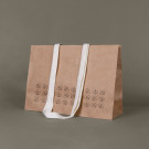 Bolsa de regalo grande de papel kraft con asas de algodón